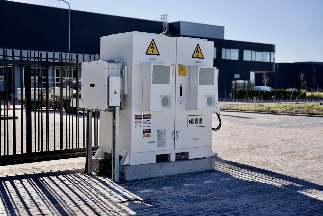Outdoor battery storage cabinet at a site entrance