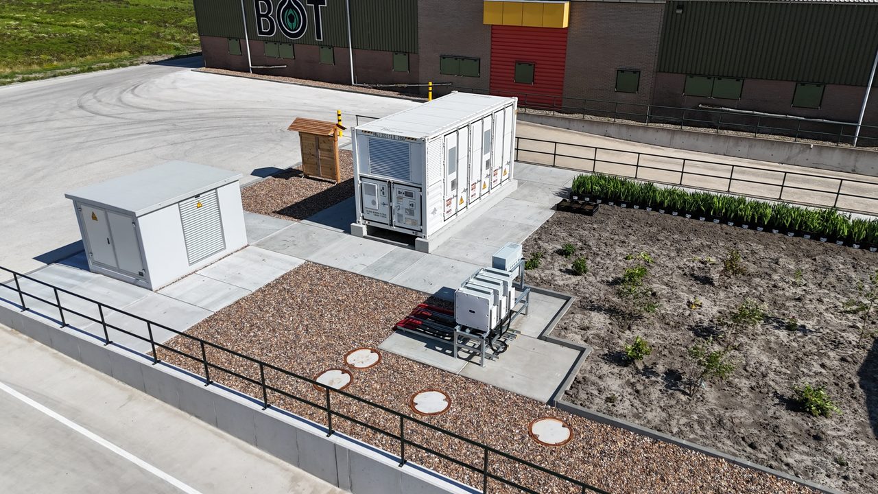 Aerial view of a battery storage installation with inverters