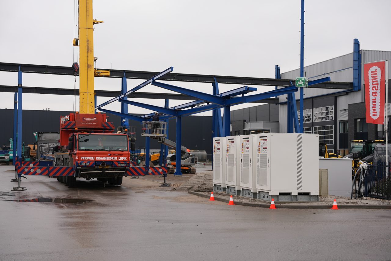 Battery storage containers and transformers on a solar site